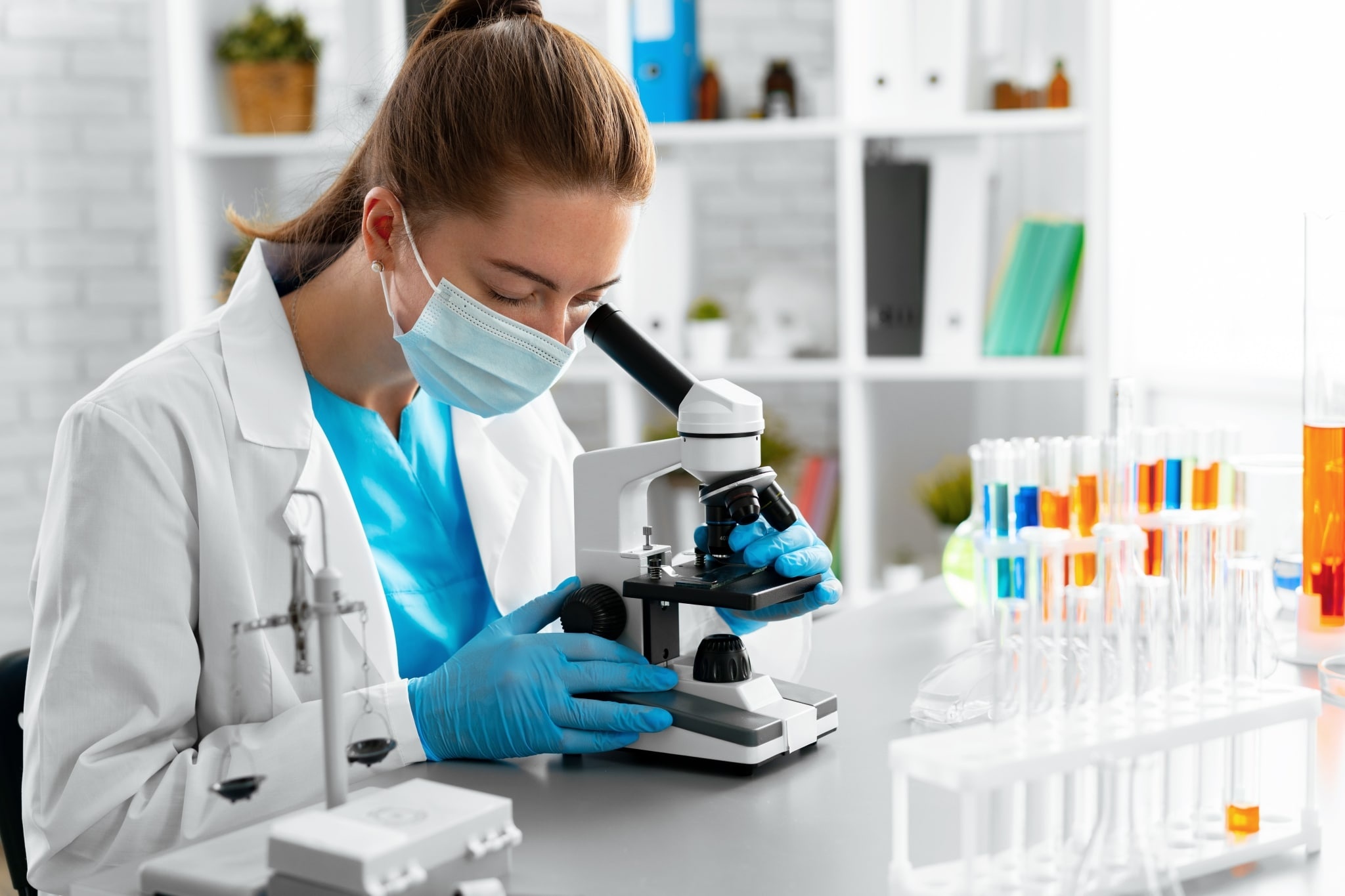Laboratory technician working with equipment